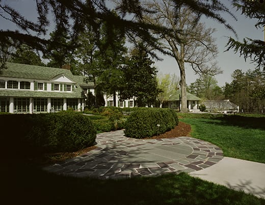 The rooftop of the museum wing is barely visible across the entry courtyard. Photograph by Elliot Kaufman.