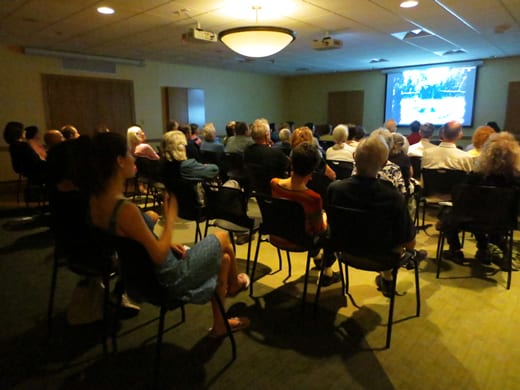 Attendees watch the Naumkeag film.