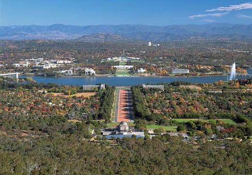 View of Canberra today from Mount Ainslie, down the Land Axis, and across Lake Burley Griffin to Parliament House. 